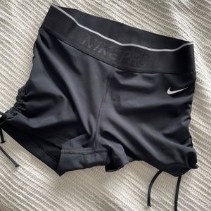 Nike pro with scrunch tie side
